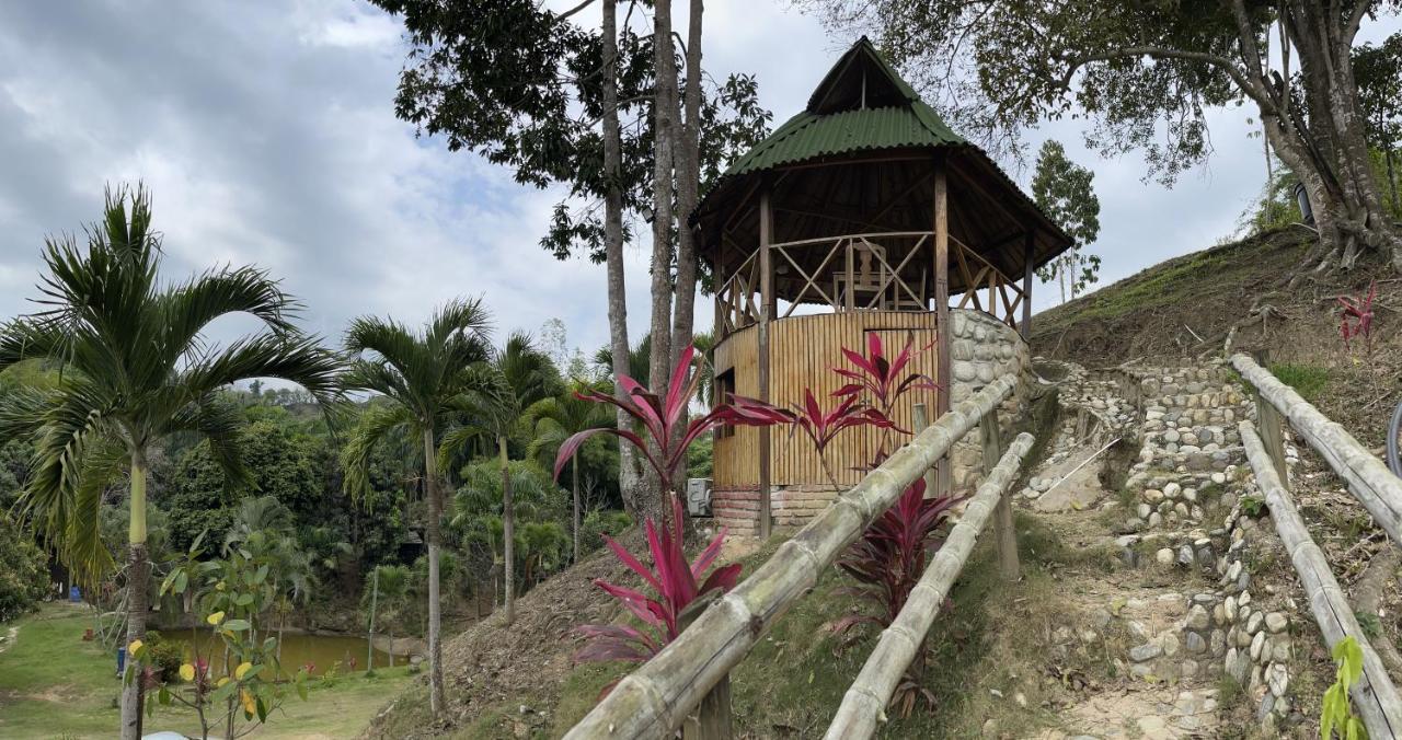 Ecohostal Palmares Del Rio Гуачака Экстерьер фото